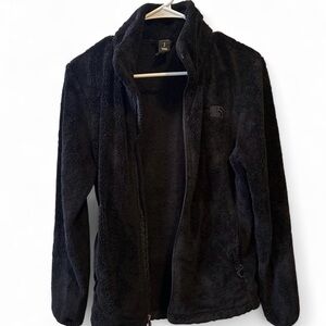 black fuzzy zip up north face jacket